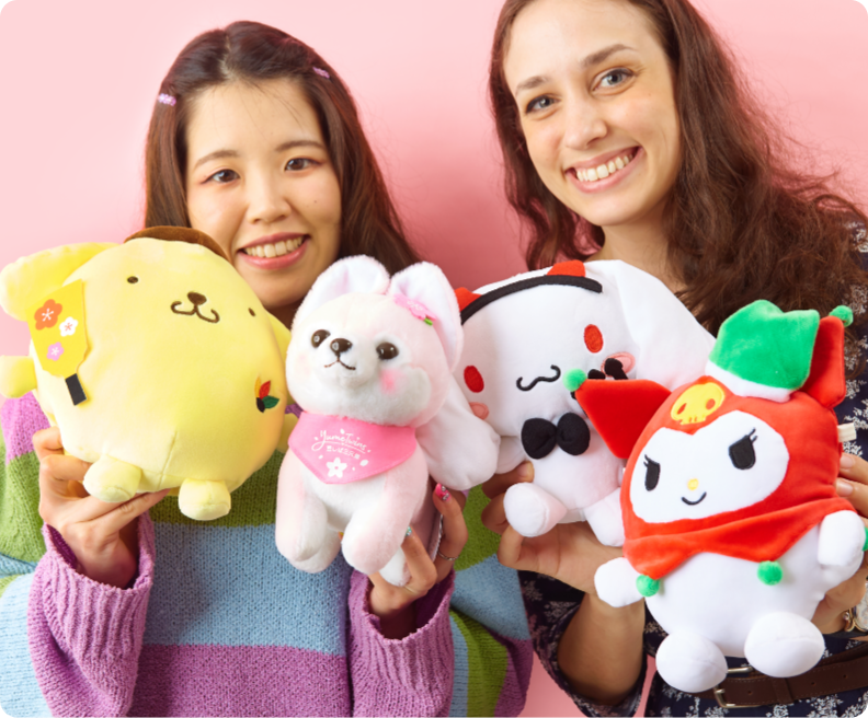 People holding plushies